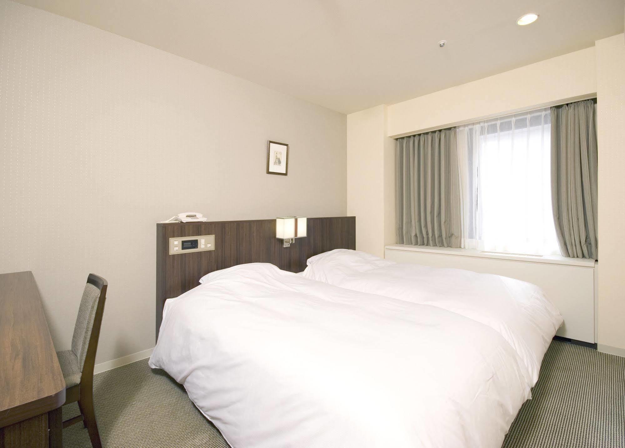 Hotel Sunroute New Sapporo Bagian luar foto