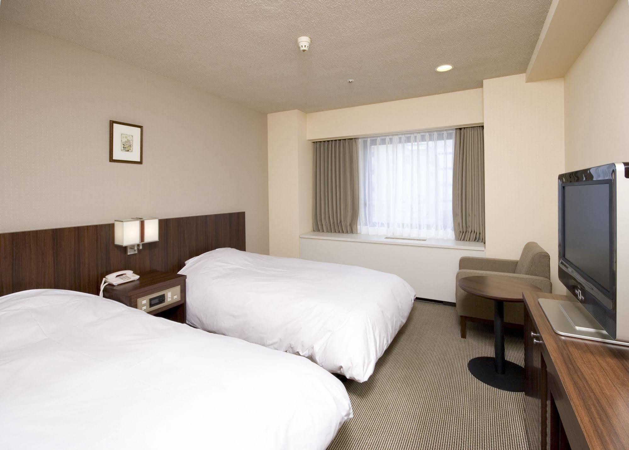 Hotel Sunroute New Sapporo Bagian luar foto